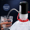 black portable electric water pump, glass of water